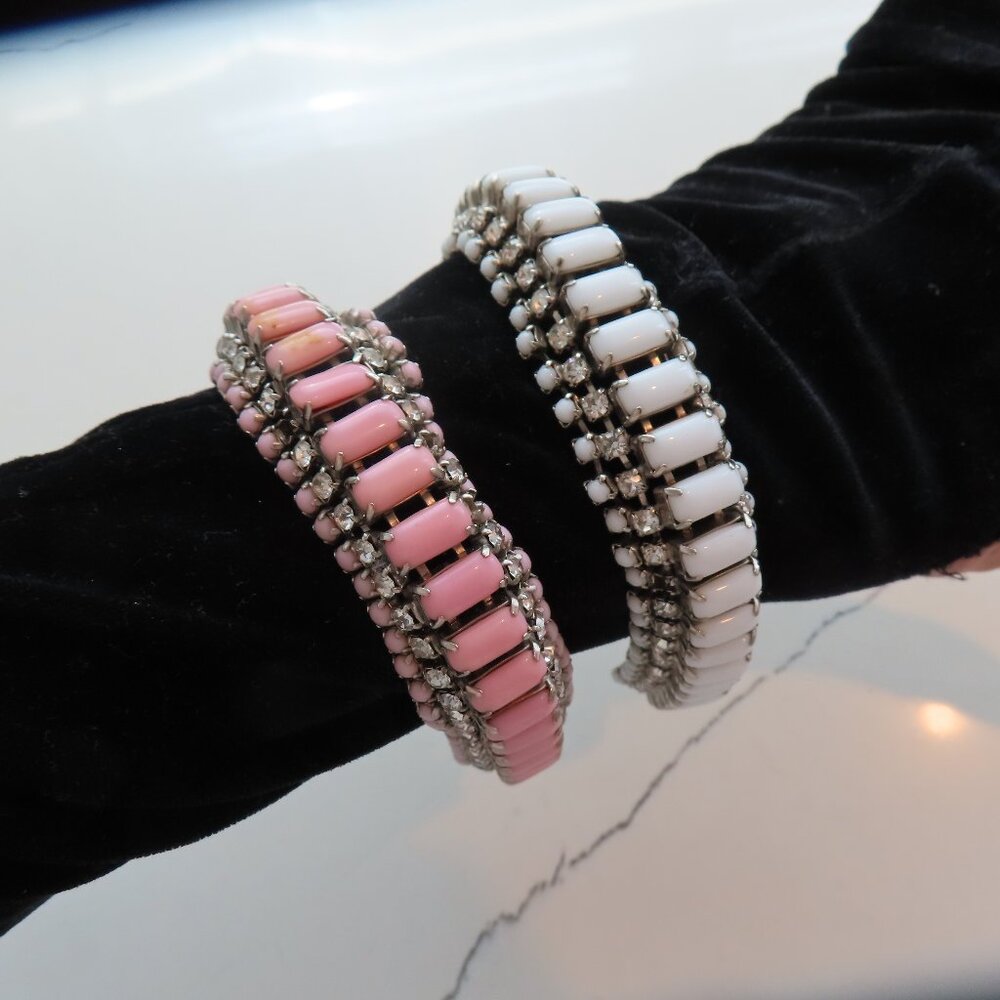 Two vintage enamel n rhinestone bracelets, one white, the other, dusty pink